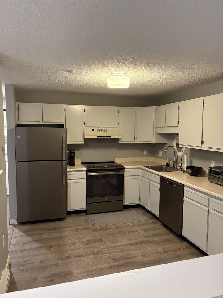 Property Photo:  130 Endicott St N  NH 03246 