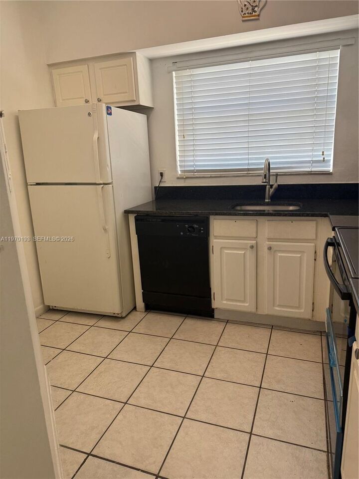 Property Photo: 1791 NW 96th Ter 4F FL 33024