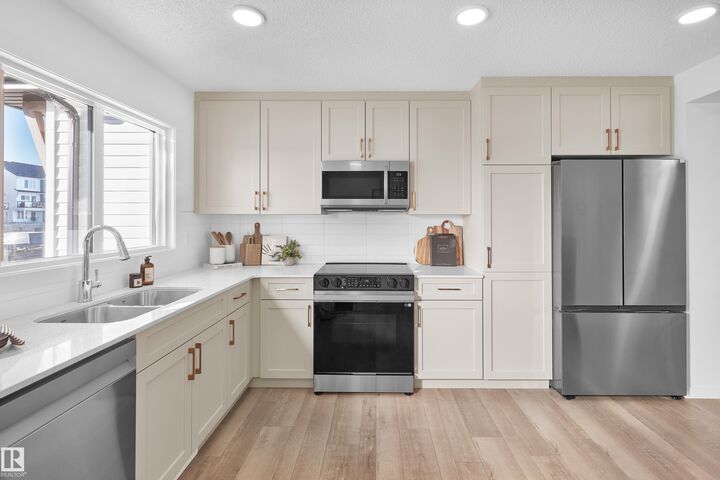 Property Photo:  3705 141 Street SW 3  AB T6W 5M9 