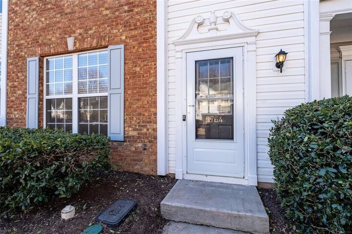 Property Photo:  5764 Reps Trace  GA 30071 