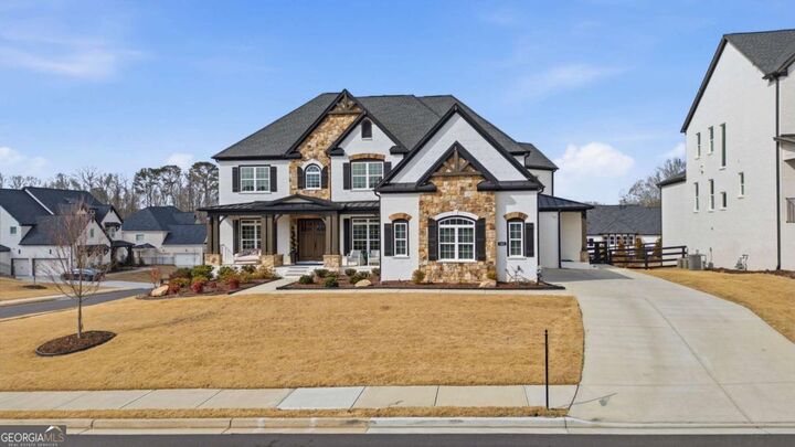 Property Photo:  7605 Poppy Mill Lane  GA 30040 