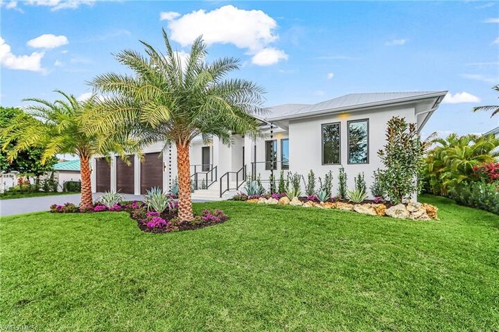 Property Photo: 2393 Longboat Dr FL 34104