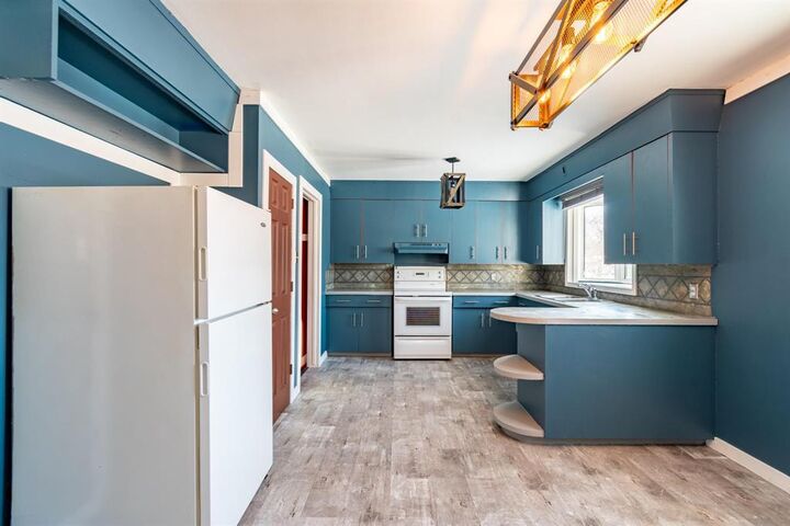 Property Photo:  733 McLean Avenue  MB R1A 0V8 