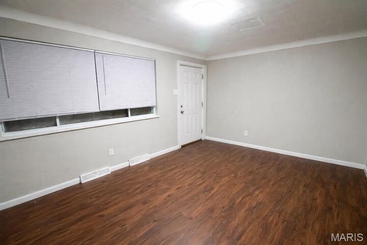 Property Photo:  6300 Evergreen Boulevard  MO 63134 