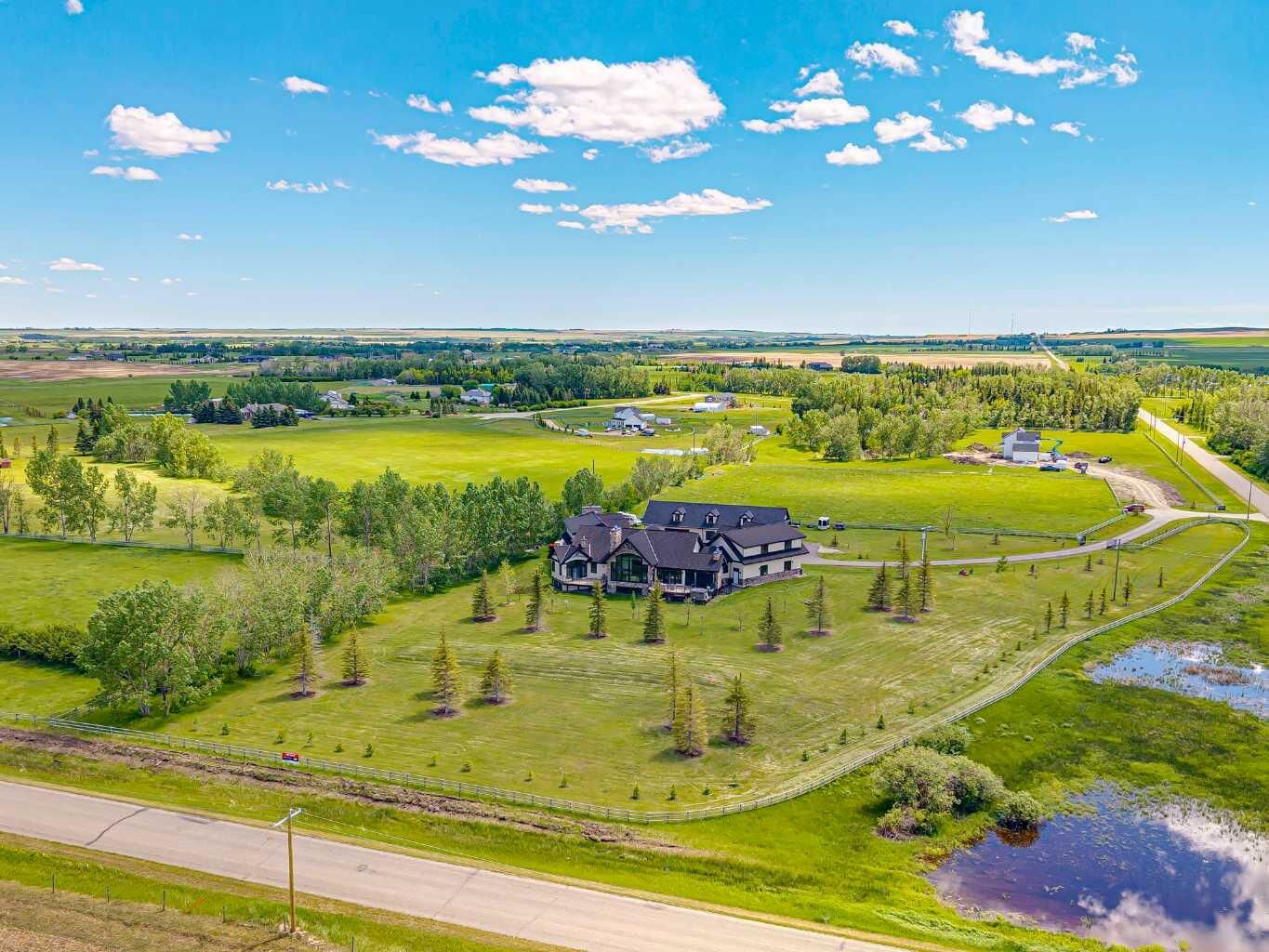 Property Photo: 242036 96 Street E AB T1S 3Y6