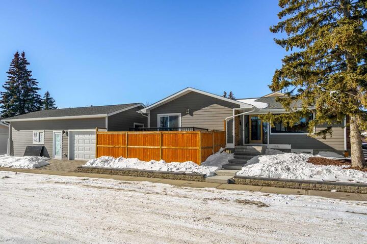 Property Photo: 119 Silvercreek Close NW AB T3B 4G2