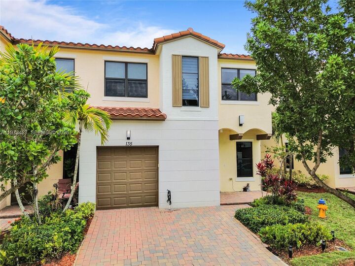 Property Photo:  135 NW 209th Trl  FL 33029 