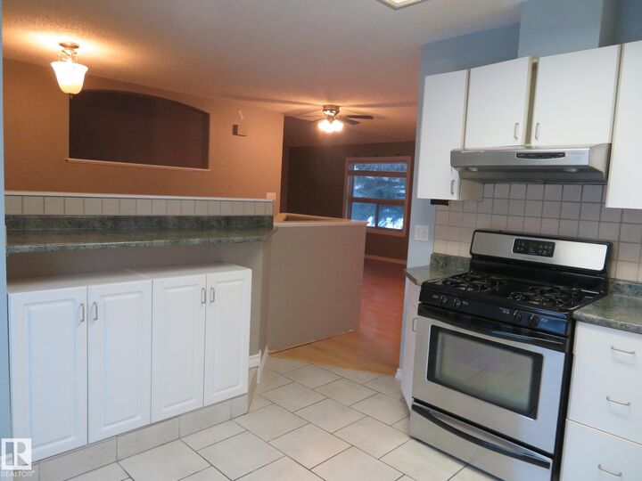 Property Photo:  1855 Mill Woods Road NW  AB T6L 6K2 