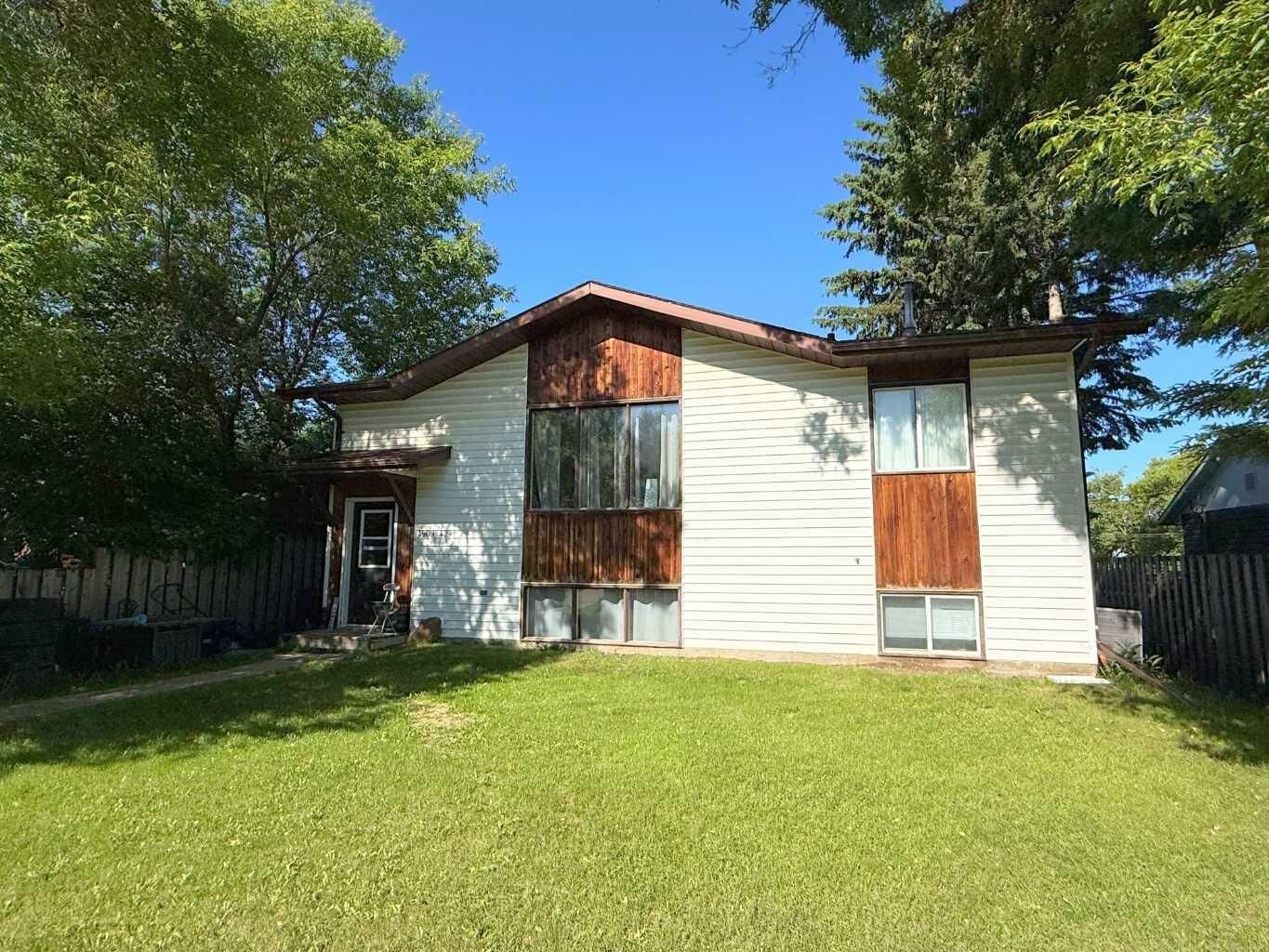 Property Photo: 4909 42 Street AB T9S 1P7