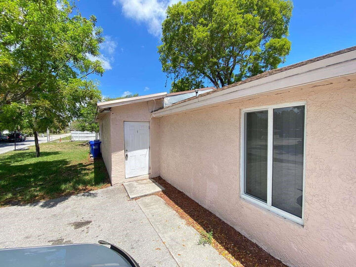 Property Photo: 141 NW 10th Street FL 33060