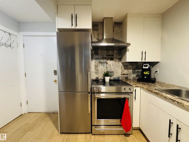 Property Photo: 10230 120 Street NW 105 AB T5K 2A3