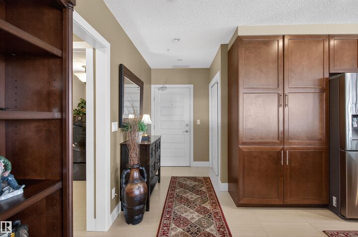 Property Photo: 1350 Windermere Way SW 405 AB T6W 2J3