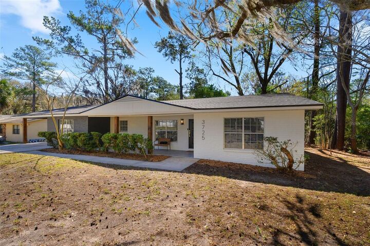 Property Photo:  3725 NW 8th Avenue  FL 32605 