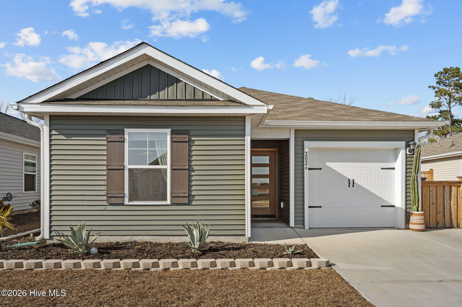 Property Photo:  2026 Course Lane  NC 28445 