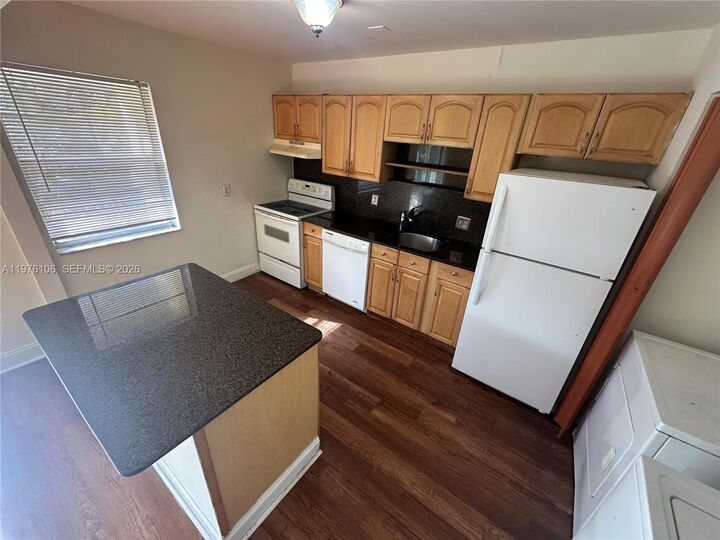 Property Photo:  3033 NW 68th St 12E  FL 33309 