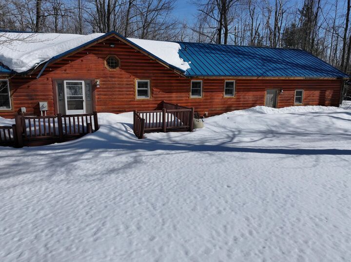 Property Photo:  6814 Whispering Pines Drive  MI 49735 