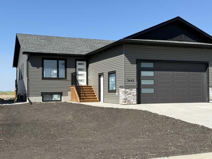 Property Photo: 3442 Victory Way AB T4H 0E4