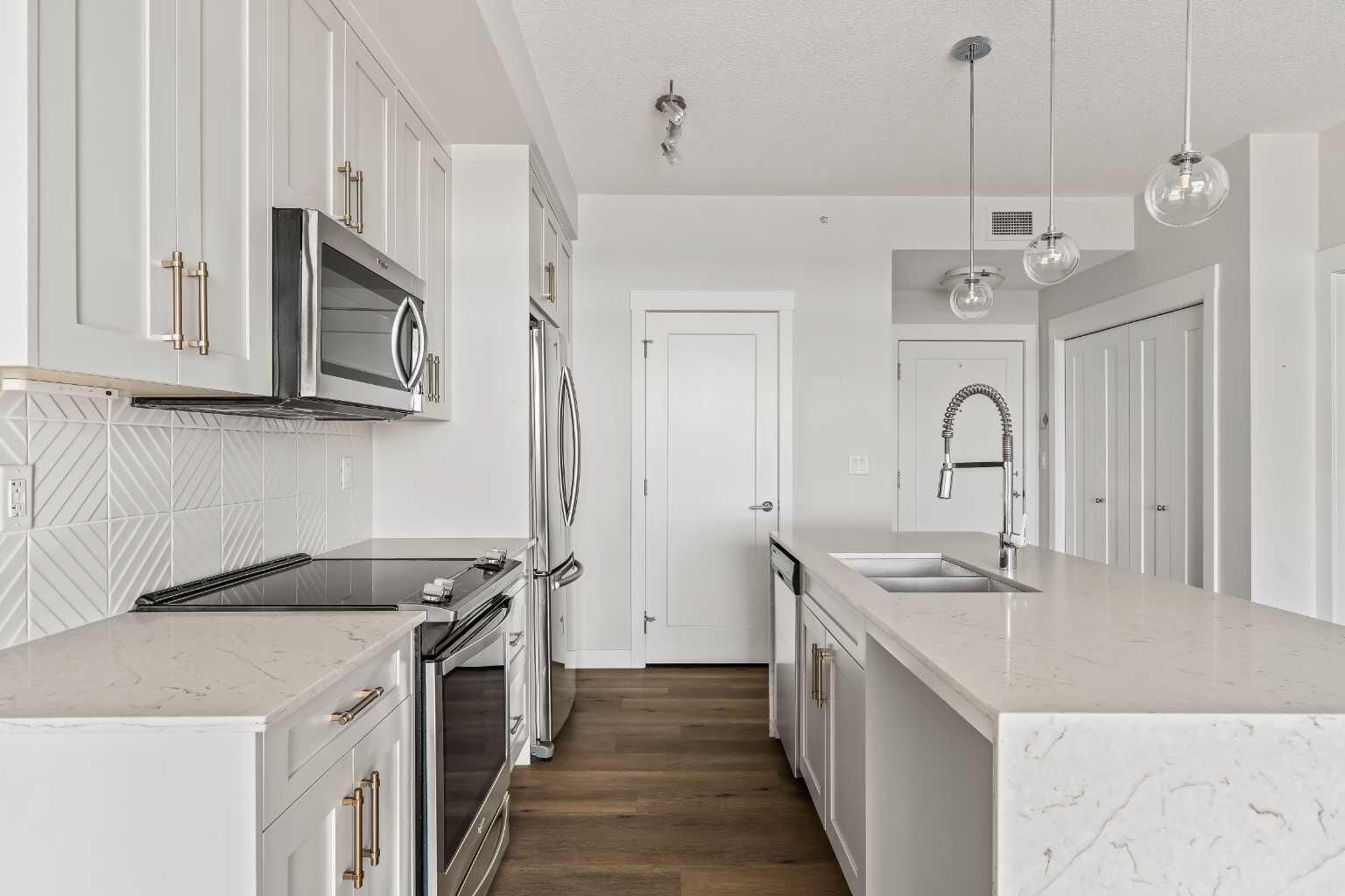 Property Photo:  300 Auburn Meadows Common SE 407  AB T3M 2Y3 