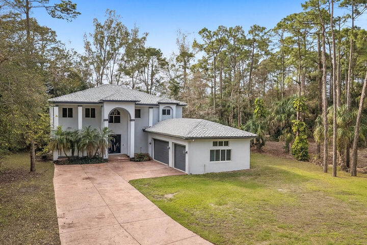 Property Photo:  5889 NW 66th Avenue  FL 33067 