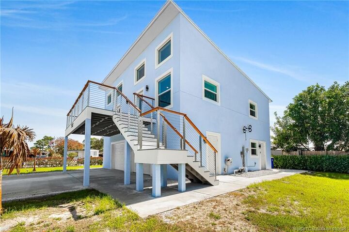 Property Photo:  7932 SE Skylark Avenue  FL 33455 