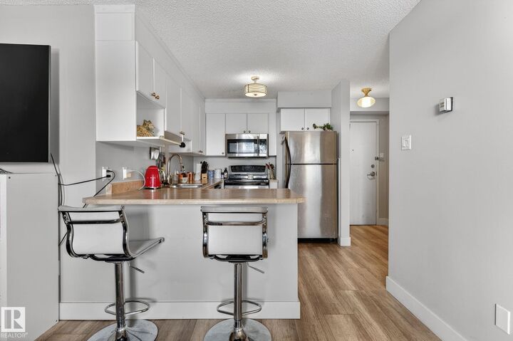 Property Photo:  9715 110 Street NW 1203  AB T5K 2M1 