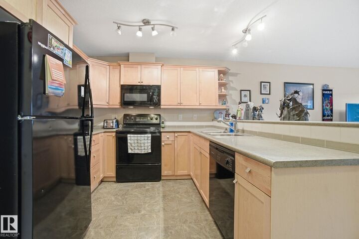 Property Photo:  278 Suder Greens Drive NW 208  AB T5T 6V6 