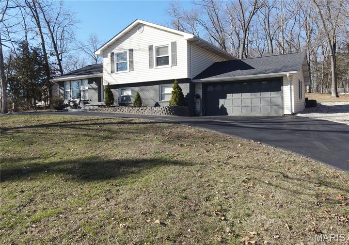 Property Photo: 5697 Lake Tishomingo Road MO 63050