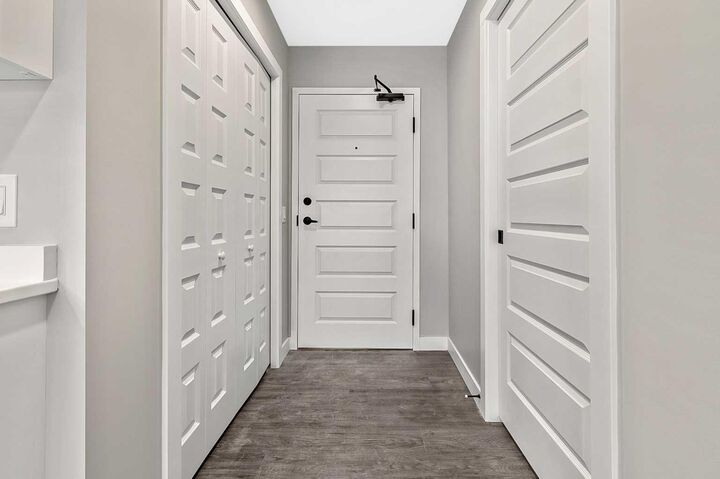 Property Photo: 97 Station Drive 302 AB T4S 0S6
