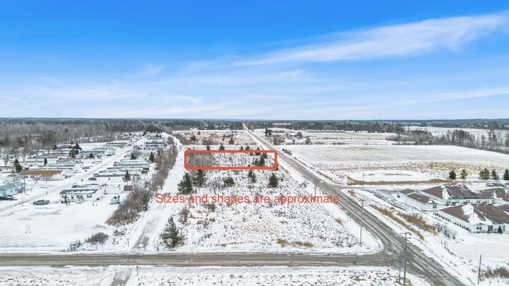 Property Photo:  V/L 0.59ac Townline Road  MI 49721 