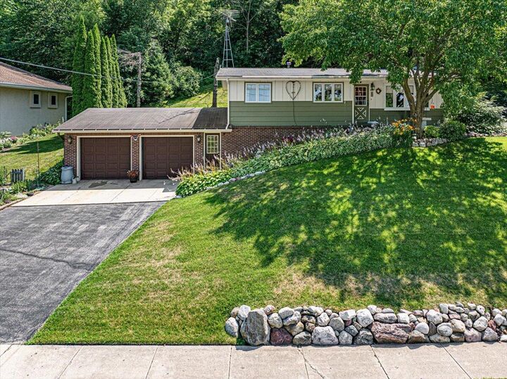 Property Photo:  295 Hartford Rd  WI 53086 