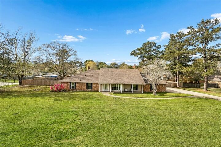 Property Photo:  125 Rue De La Paix Drive  LA 70461 