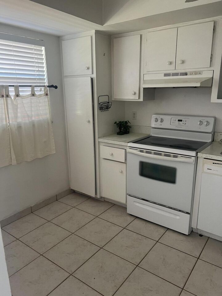 Property Photo:  1151 Carlton Court 103  FL 34949 