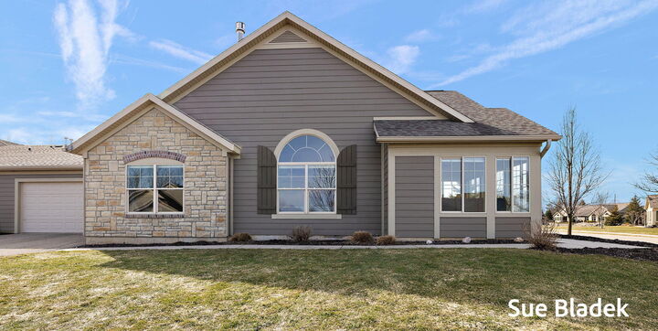 Property Photo: 1210 Waterwalk Drive MI 49423