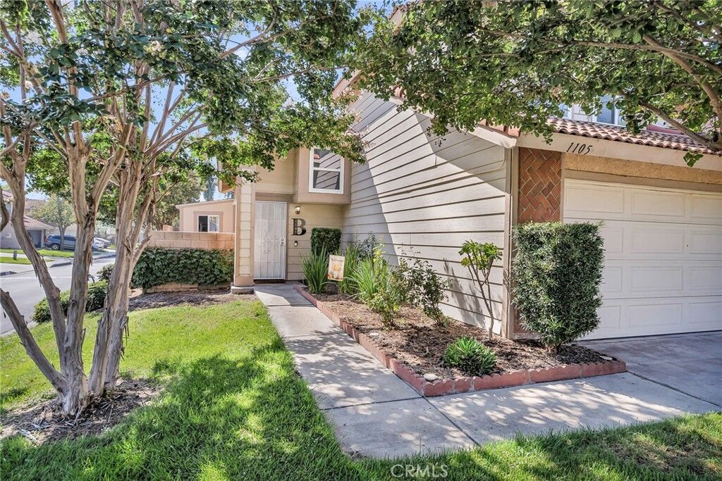 Property Photo:  1105 W Victoria  CA 92376 