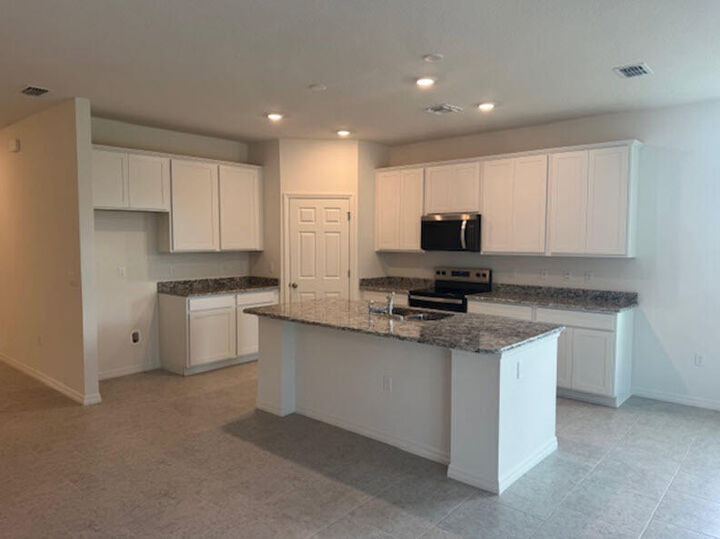 Property Photo:  3457 SW Ellis Street  FL 34953 