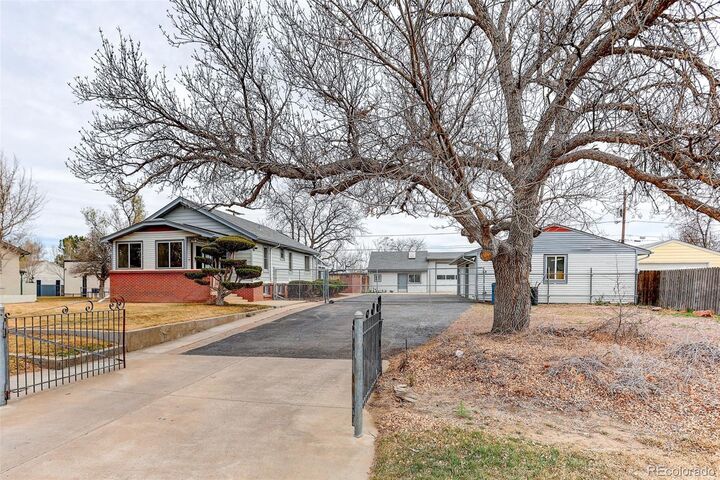 Property Photo:  6170 N Oneida Street  CO 80022 