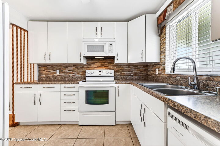 Property Photo: 201 Saint Lucie Lane FL 32931