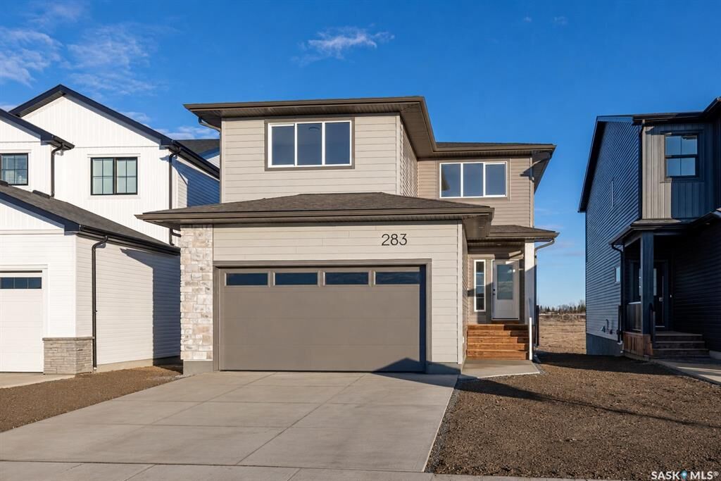 Property Photo: 283 Nazarali Way SK S7V 1X6