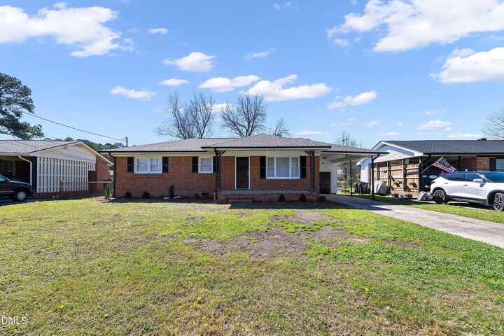 Property Photo:  212 Bunche Drive  NC 27530 