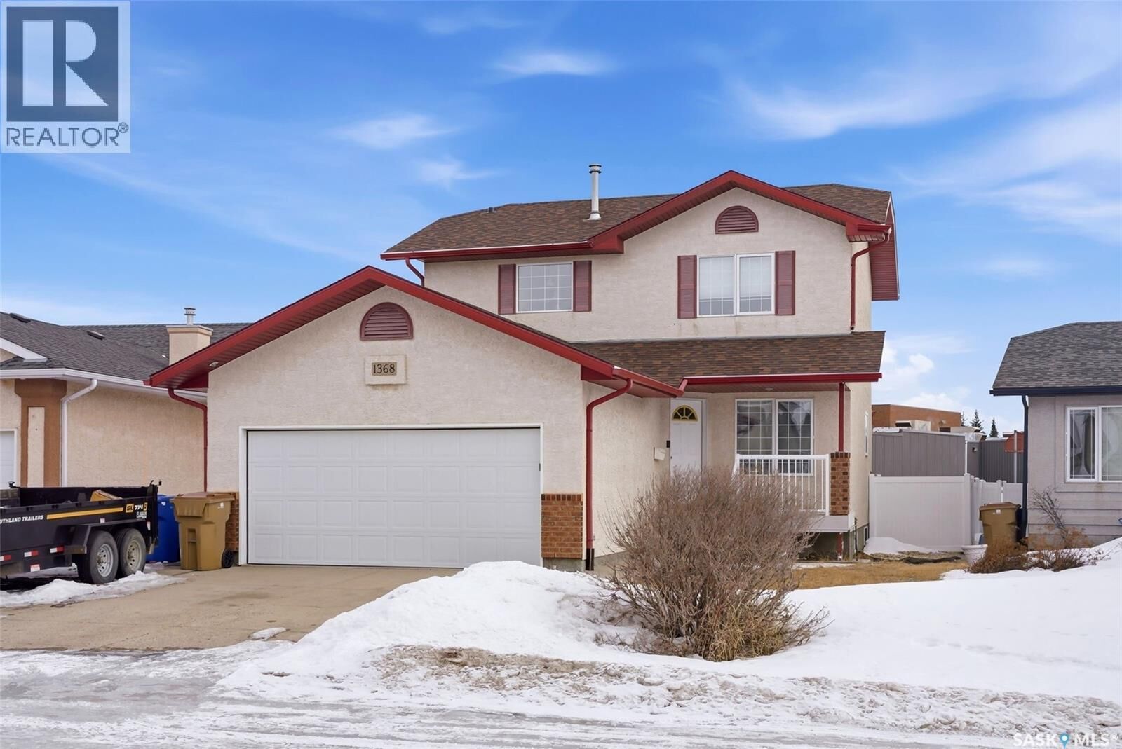 Property Photo: 1368 Maple Leaf Crescent N SK S4R 4J4