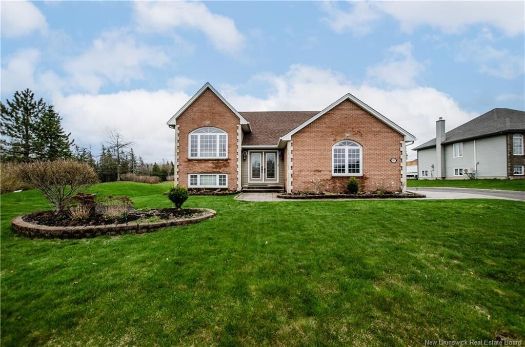 Property Photo: 717 Royal Oaks Boulevard NB E1H 3N8