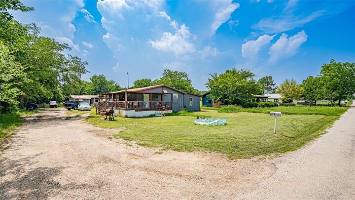 Property Photo:  291 County Road 4858  TX 76071 