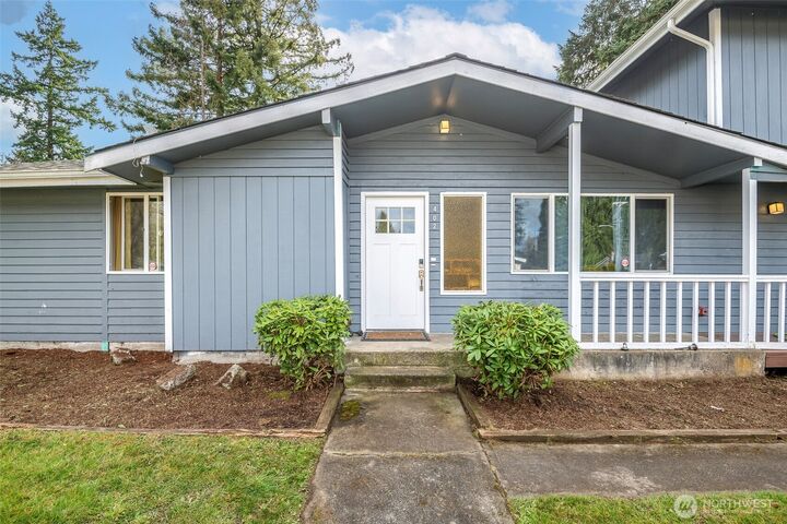 Property Photo:  402 E 91st Street  WA 98445 
