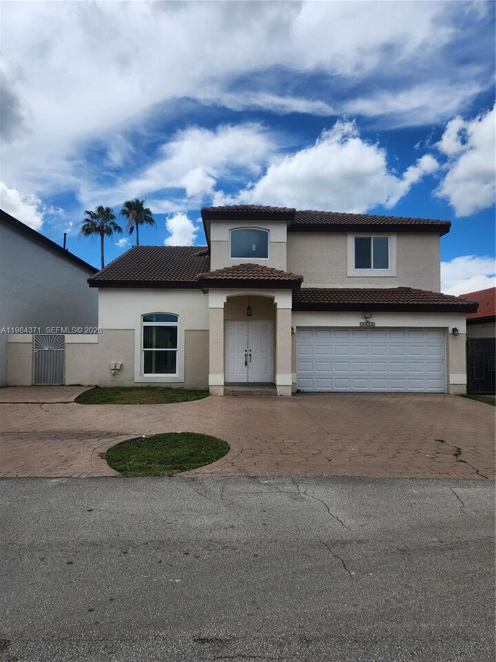 Property Photo:  19634 NW 83rd Pl  FL 33015 