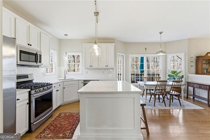 Property Photo:  5055 Hamptons Club Drive  GA 30004 