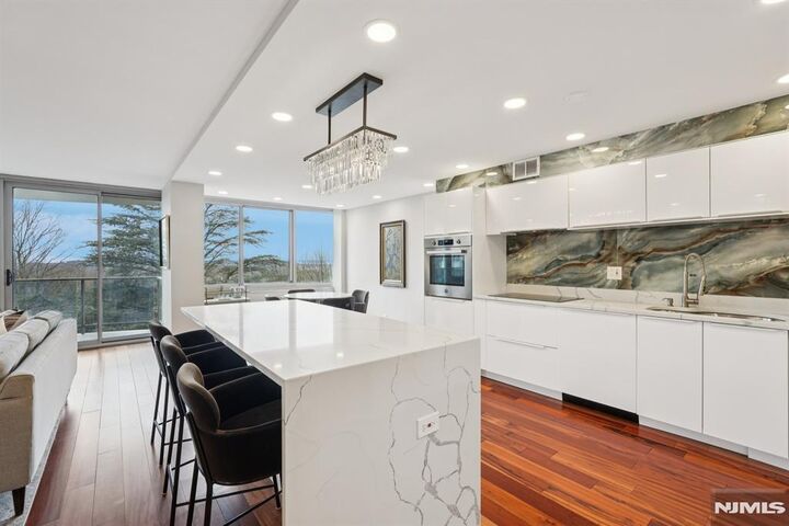 Property Photo:  1 Claridge Drive 104  NJ 07044 