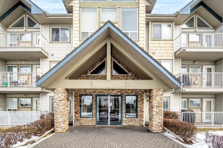 Property Photo: 7 Harvest Gold Manor NE 313 AB T3K 4Y3