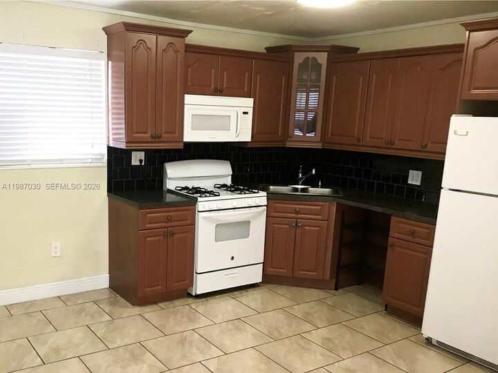 Property Photo:  4250 SW 67th Ave 32  FL 33155 