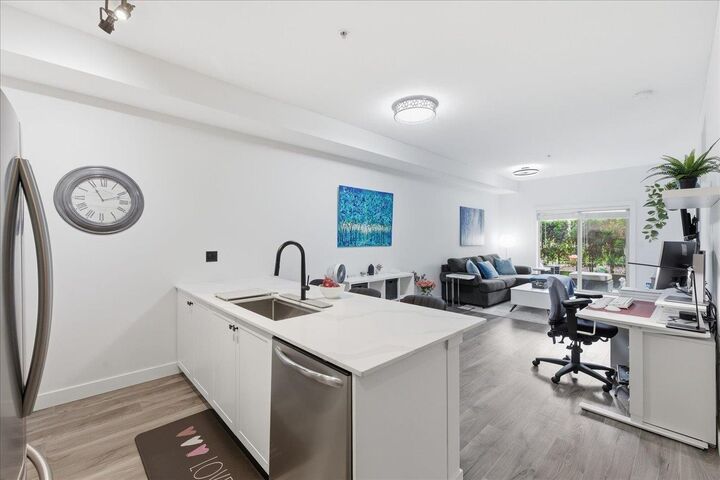 Property Photo:  10088 148th Street 111  BC V3R 3M9 