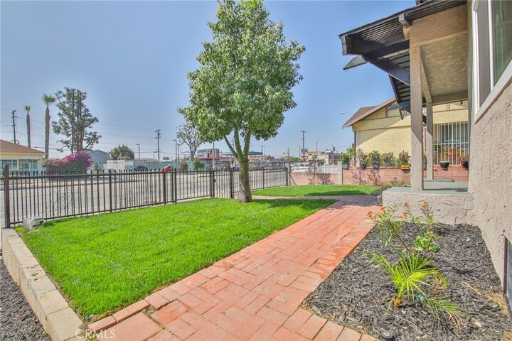 Property Photo:  1331 W Manchester  CA 90044 